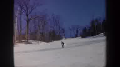Vermont USA (1962): Man Skiing Down A Mountain Passing People Watching Him