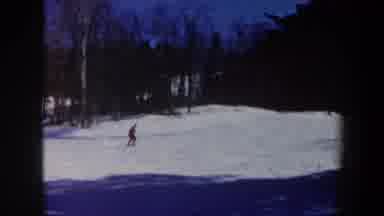 Vermont USA (1962): A Skier Skiing Across And Mountain Landscape