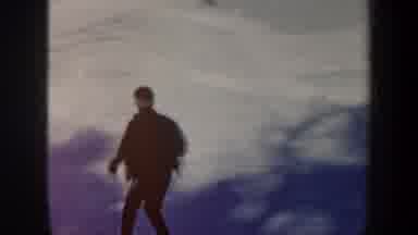 Vermont USA (1962): Two Boys Ski Down A Small Hill Together In The Snow