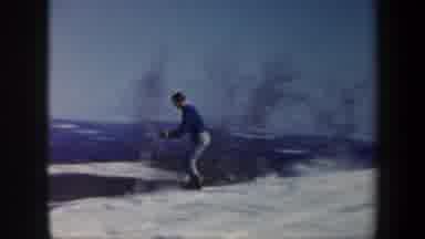 Vermont USA (1962): A Man Is Enjoying By Doing Skiing On The Snow Mountains
