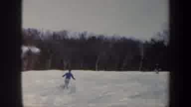 Vermont USA (1962): Skier Wearing Blue Shirt Skiing Through Powder Snow On A