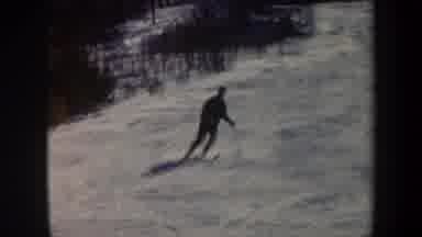 Vermont USA (1962): Man Skiing Down Ski Slope Falls Over Into The Snow