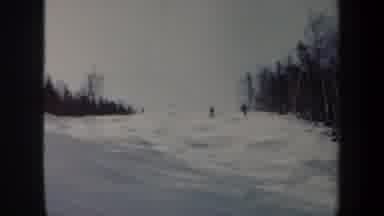 Vermont USA (1962): Skiers Absorb The Bumps As They Descend Through A Snowy Mogul