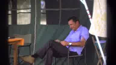 Kenya (1969): Man Read The Book Peacefully On A Camping Day Beside His Tent