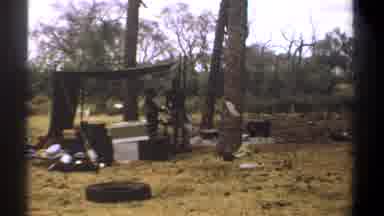 Kenya (1969): A Couple Of People In The Forest With A Makeshift Tent