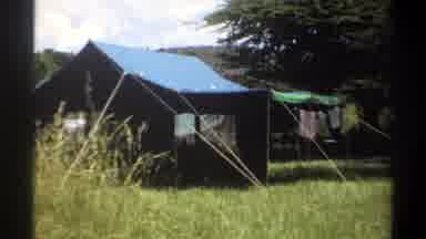 Lagos Nigeria (1969): Zoom-In On Summer Tent In In Hilly Countryside With Clothes