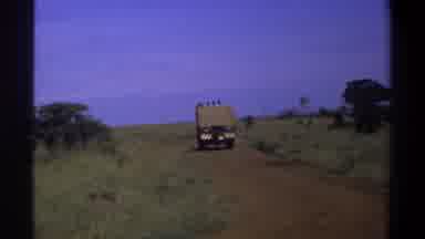 Lagos Nigeria-1969: Loaded Truck Riding On A Dirt Road To Unload In Savanna
