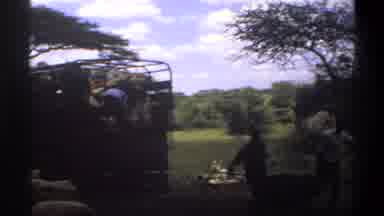 Lagos Nigeria (1969): Group Of People Unloading Truck On A Clear Sunny Day
