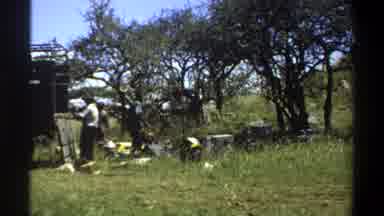 Lagos Nigeria (1969): Men Unload Supplies From The Back Of A Truck And Place Them