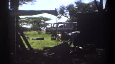 Lagos Nigeria (1969): Man Chopping Wood Campsite Grass Trees Suv Truck 1060s