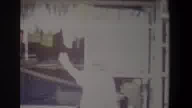 Pretoria South Africa (1969): Person With Hat Waves Then Explores Quilts At A