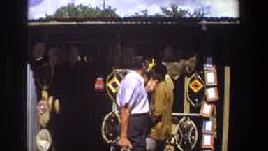 Pretoria South Africa (1969): Man In Striped Shirt Walking Around A Market Waves