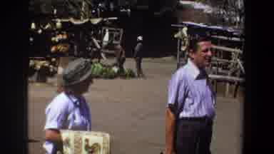 Pretoria South Africa (1969): Man And Woman Shopping In A Village Marketplace Dirt