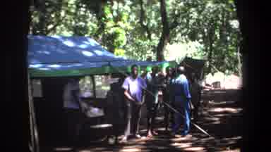 Pretoria South Africa (1969): People Standing Talking Next Blue Tent On A Sunny