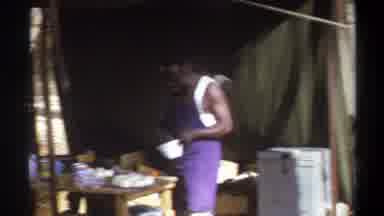 Cape Town South Africa (1969): Men Cooking Some Food In A Tent