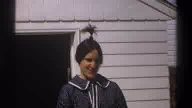 Cape Town South Africa (1969): A Girl In Collared Shirt With A Ponytail On Top Of