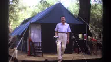 Khartoum Sudan (1969): A Man Walking Out Of A Tent Holding Some Kind Of Tool