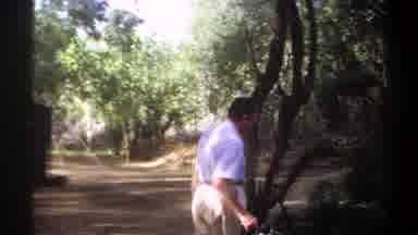 Khartoum Sudan (1969): A Man In The Woods Gestures Toward A Pitched Tent