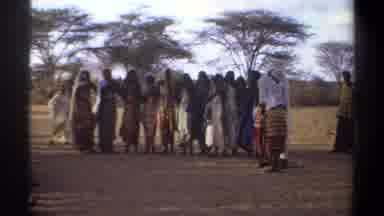 Khartoum Sudan (1969): People In Flowing Robes Standing Clapping Hands On A Sunny