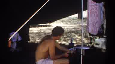 Khartoum Sudan (1969): A Man With No Shirt On A Hot Day Cooking And Camping