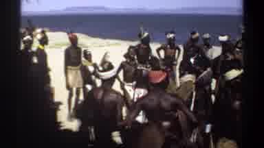 Khartoum Sudan (1969): Large Group Of People Dancing At Beach On Bright Sunny Day