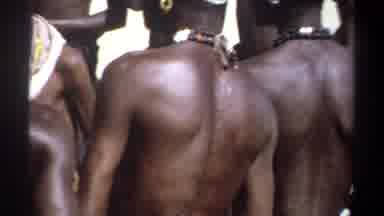 Khartoum Sudan-1969: A Tribal Gathering of Shirtless People with Beaded Necklaces and Back Scars