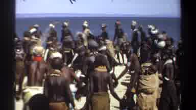 Khartoum Sudan (1969): Large Group Of People Dancing At Beach On Bright Sunny Day