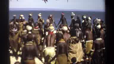 KHARTOUM SUDAN-1969: Tribal African Community Celebrating Through Dance On A Beach
