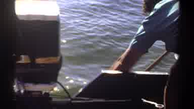 Khartoum Sudan (1969): Two Men On A Boat With A Tool In The Water Trying To Reach