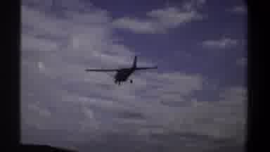 Khartoum Sudan (1969): Airplane Sky Clouds Sunny Daytime Buildings Vehicles Pilot