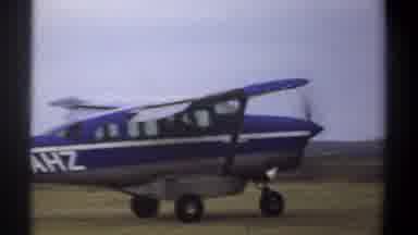Khartoum Sudan (1969): Blue White Airplane Taking Off From Grass Airstrip On Clear
