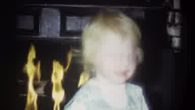 Troy New York USA (1973): Two Caucasian Kids One Picking Up A Christmas Present