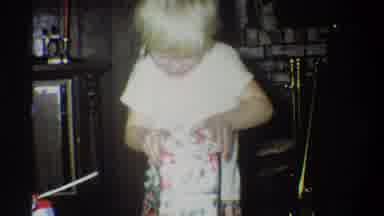Troy New York USA (1973): The Little Boy Try To Open His First Present That Was