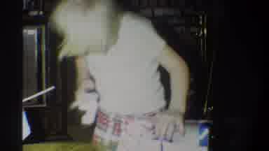 Troy New York USA (1973): Blonde Child Ripping Open Holiday Wrapped Gift Boxes In
