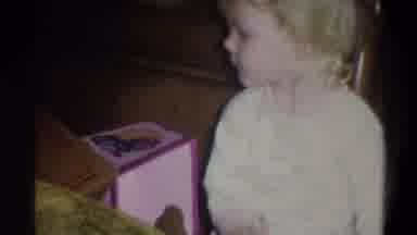 Troy New York USA (1973): Vintage Clip Of A Little Girl In A Nightgown Holding A