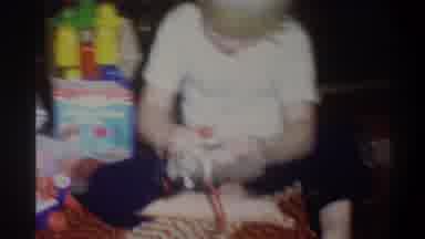 Troy New York USA (1973): Young Boy Playing With Old Toys While Tv Is On In The