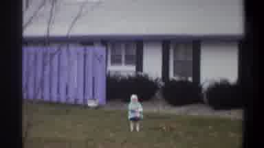 Troy New York USA (1973): Girl Wearing Blue Coat Standing By White House On Cloudy