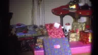 Troy New York USA (1973): A Pile Of Pink And Purple Presents Lined Up Along The