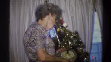 Troy New York USA (1973): Old Woman Decorating Christmas Tree
