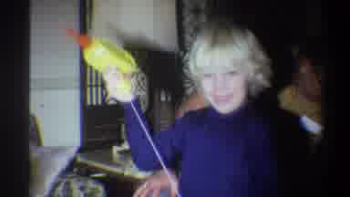 TROY NEW YORK USA-1973: Boy In Foreground Pulling On String Of Toy He's Holding