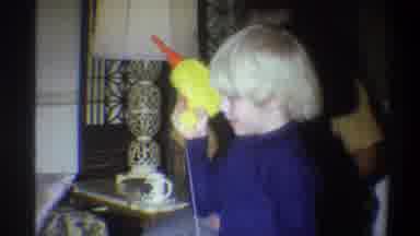 Troy New York USA (1973): Child Testing Out His New Electric Toy