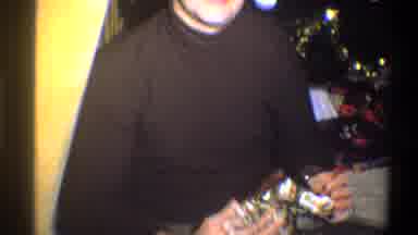 Troy New York USA (1973): A Father Unwrapping His Present Near The Christmas Tree