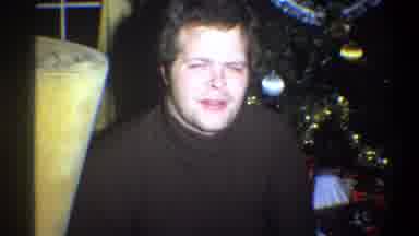 Troy New York USA (1973): Man Enjoying A Christmas Moment With An Elderly Lady
