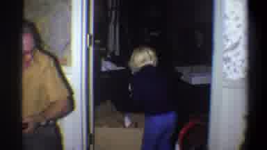 Troy New York USA-1973: Child Playing With Toy Gun And Family Interaction