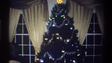 Troy New York USA (1973): Kids Playing Near Christmas Tree With Lights On It And