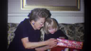 Troy New York USA (1973): Two Kids Trying To Open Their Gift Box With The Help Of