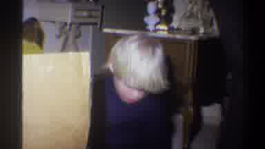 Troy New York USA (1973): A Man Speaks While Flashed In The Face With A Light