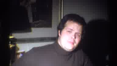 Troy New York USA (1973): A Man Wearing A Turtleneck Shirt Talks And Gestures