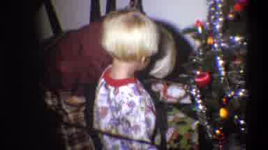 Troy New York USA (1973): Child On Christmas Eve With Many Looking Toys Does Not