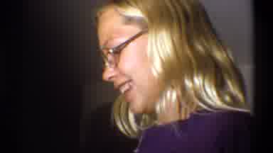 Troy New York USA (1973): A Blonde Girl Takes Pictures With A Camera While A